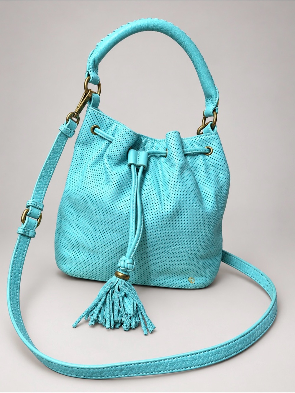 Elliott Lucca Turquoise 100% leather Drawstring Bucket crossbody Bag with Tassel